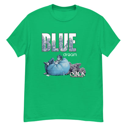 A green cotton graphic t-shirt with the words Blue Dream. A monochromatic blue cartoon depiction of a stoner passed out in a bean back with marijuana buds behind him.