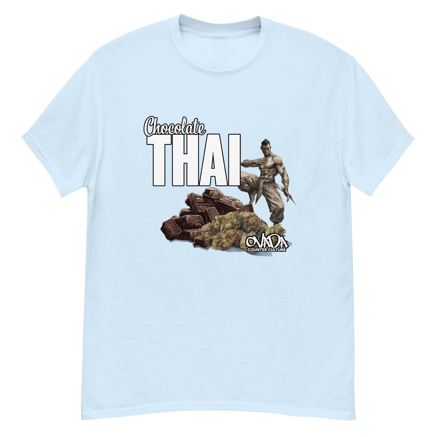 A light blue cotton graphic t-shirt with the words Chocolate Thai. A cartoon depiction of a Muay Thai Fighter is standing on a pile of chocolates, with marijuana buds in front of it. 