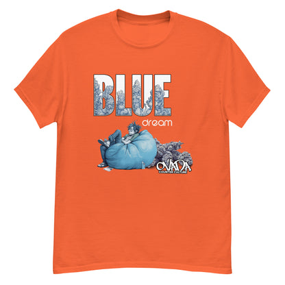 An orange cotton graphic t-shirt with the words Blue Dream. A monochromatic blue cartoon depiction of a stoner passed out in a bean back with marijuana buds behind him.